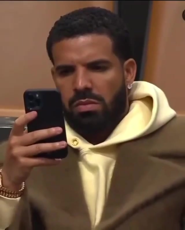 Drake on His Phone meme template blank