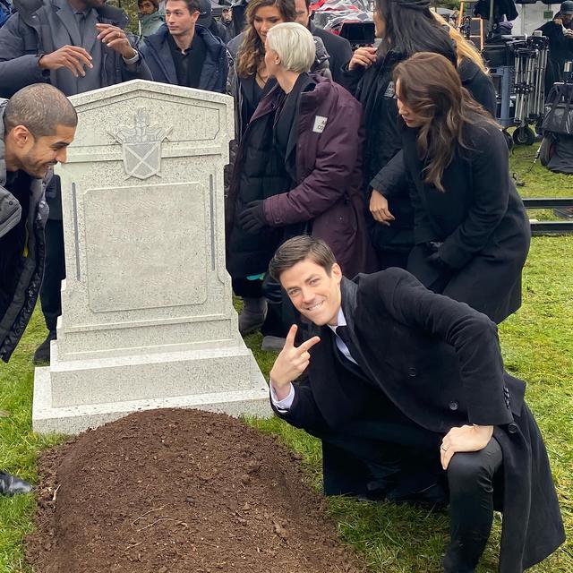 Grant Gustin Posing Next to a Grave meme template blank
