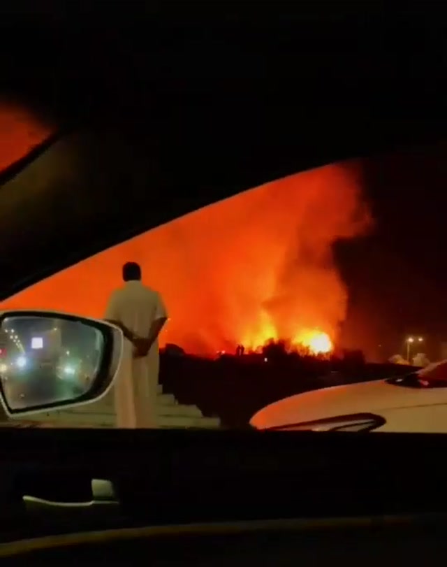 Man in Thobe Watching Fire meme template blank