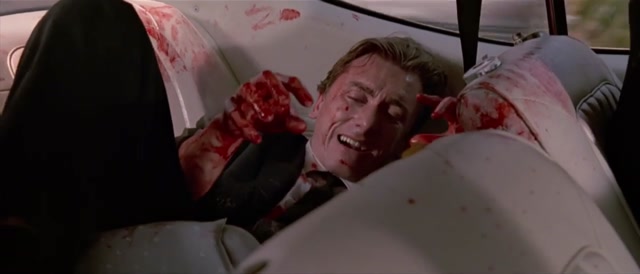 Mr. Orange Bleeding in Back Seat meme template blank