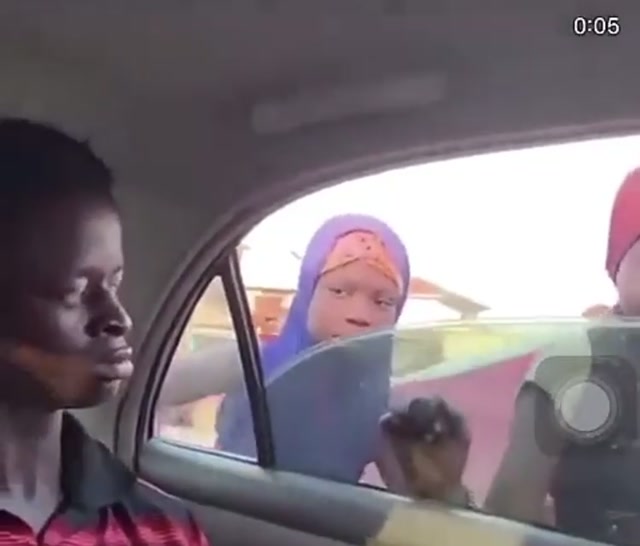 Unbothered Guy in Car Ignoring People Outside meme template blank